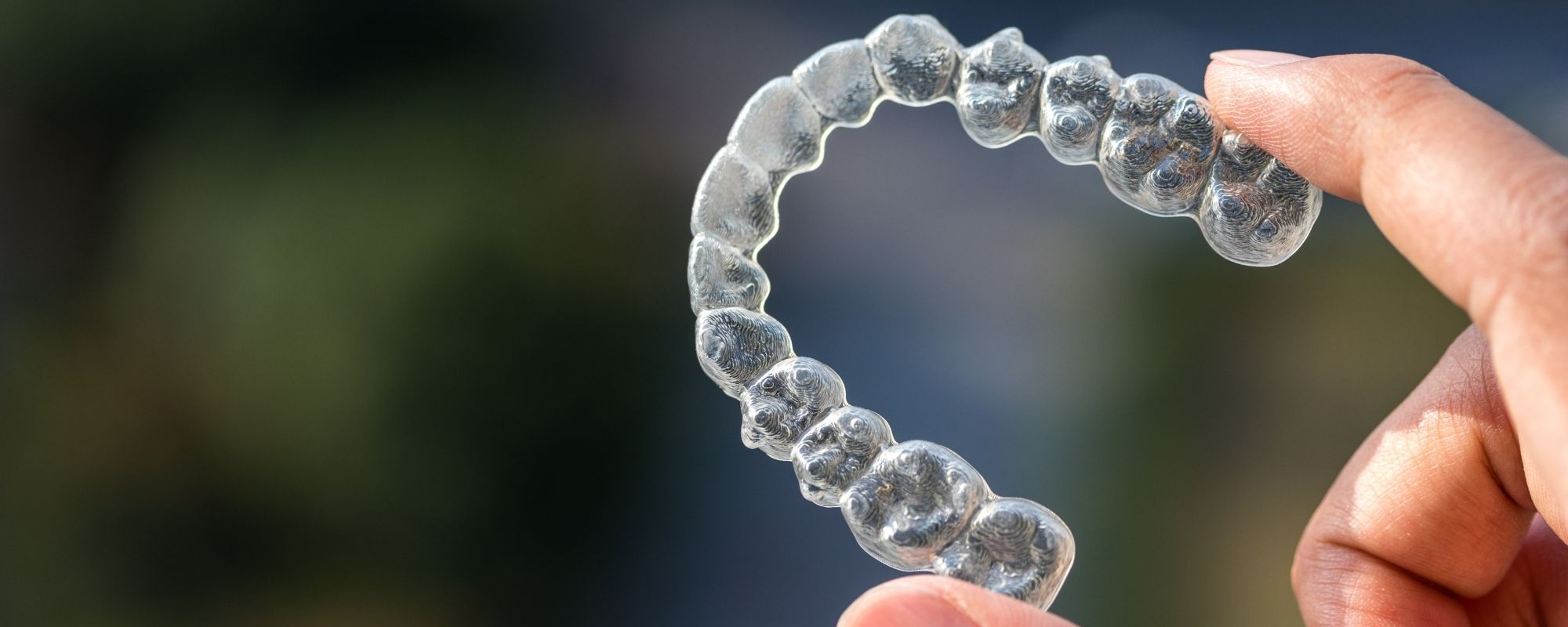 Invisalign clear aligners straighten teeth discreetly using invisible trays