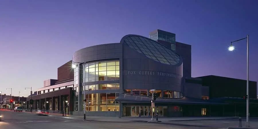 The Fox Cities Performing Arts Center building in Appleton, Wisconsin, illuminated at dusk.