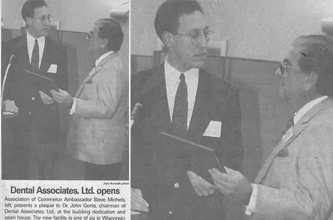 An image of a newspaper clipping showing a man receiving a plaque at a dedication