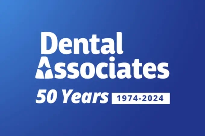 Image of a Dental Associates 50th anniversary logo on a blue background