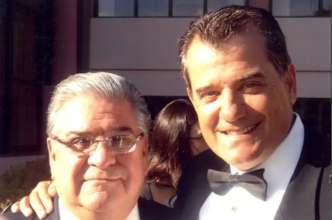 two-men-in-formal-attire-posing