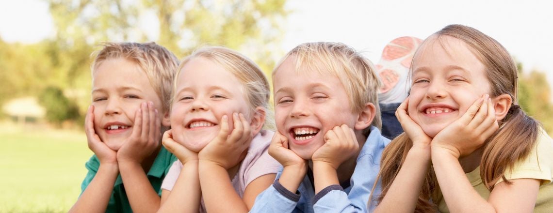 children smiling together for children's dental health month