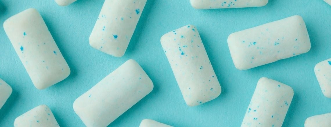 chewing gum pieces on a blue background