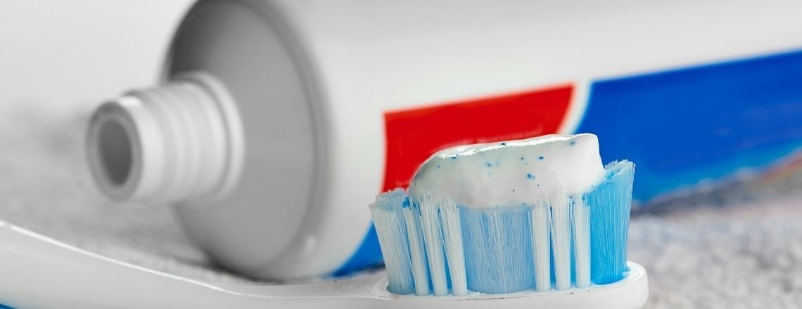 toothbrush and toothpaste with fluoride