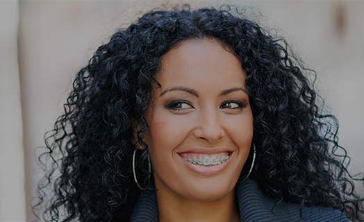 smiling woman with braces